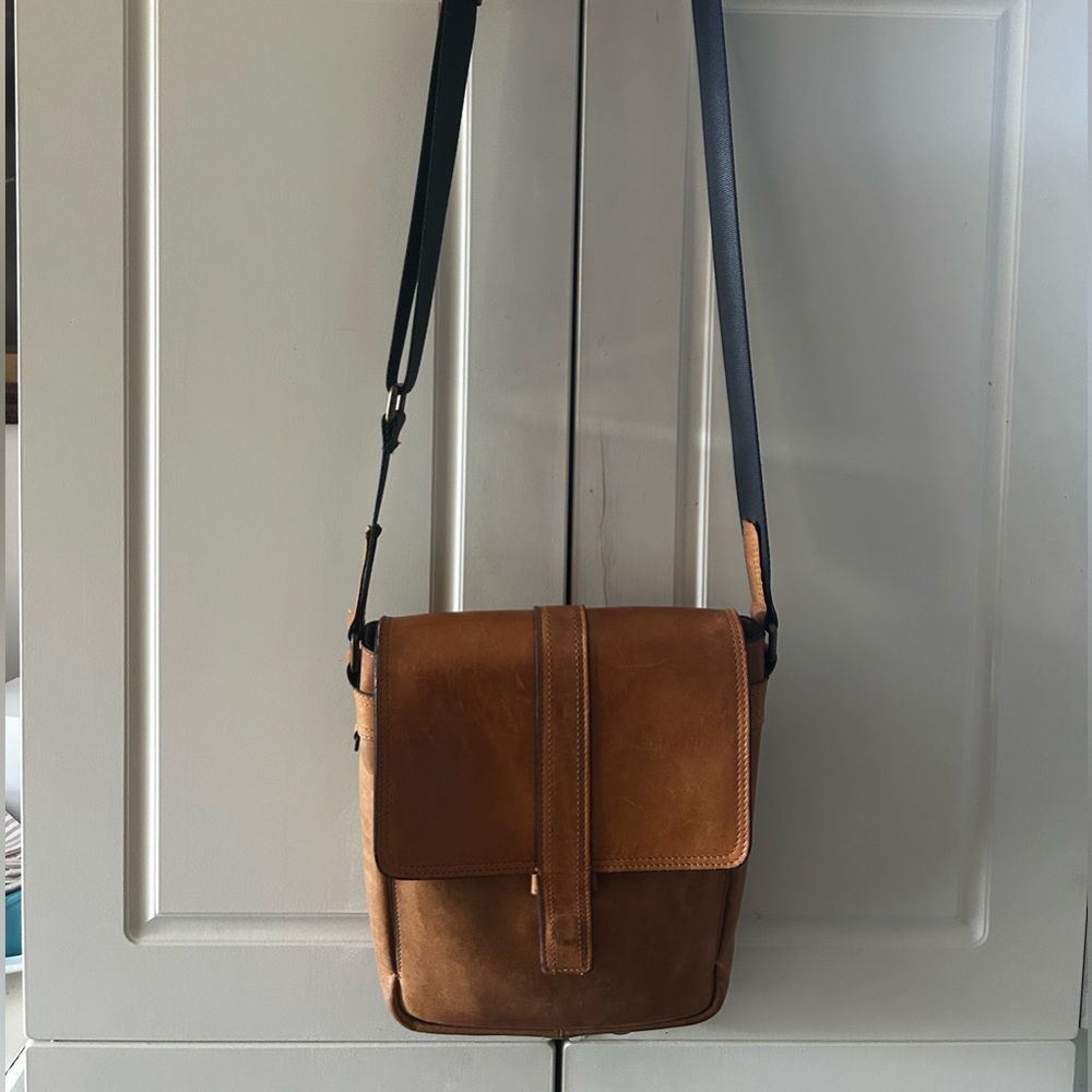 Tumi leather crossbody bag